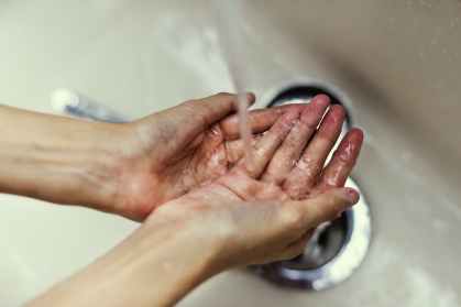 person wash hands